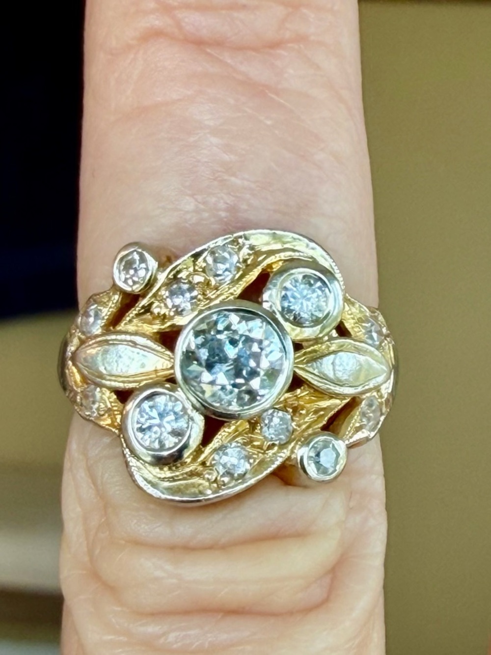 14 Karat gold and diamond rang.